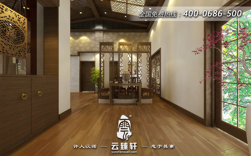 玄關選擇嚴謹風格的案幾,案幾上擺放的佛像頭像